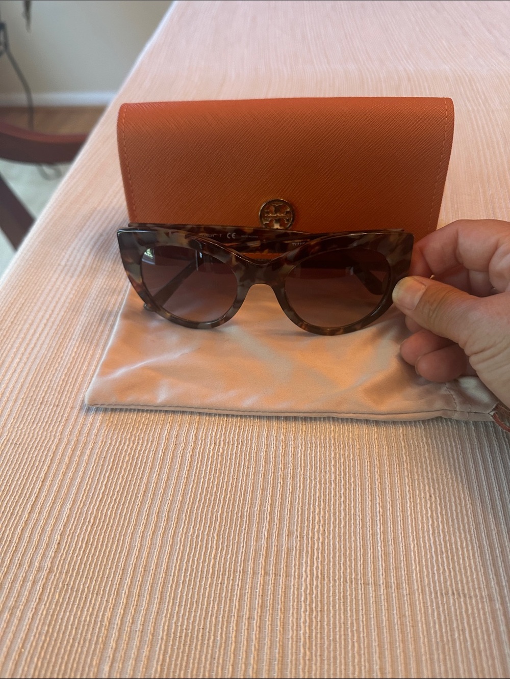 Tory Burch brown/gray/tortoise sunglasses with case and dust sleeve.